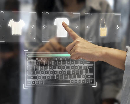 An e-commerce website on a laptop with AI and 3D icons overlaid